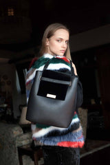 shoulder bag in black leather and black velvet